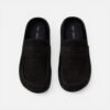 Mules in black and cream colors