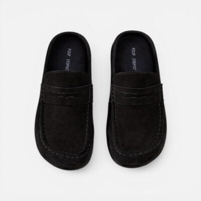 Mules in black and cream colors