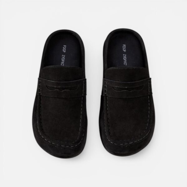 Mules in black and cream colors