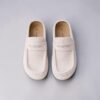Mules in black and cream colors