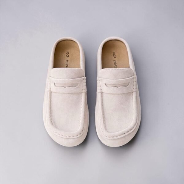 Mules in black and cream colors